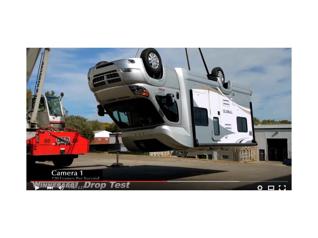 Winnebago Trend hanging upside down about to be drop tested.