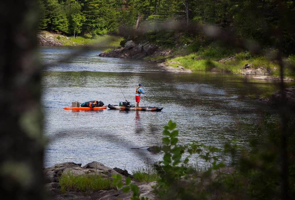 James McBeath fishing a secret spot with camping gear in tow.