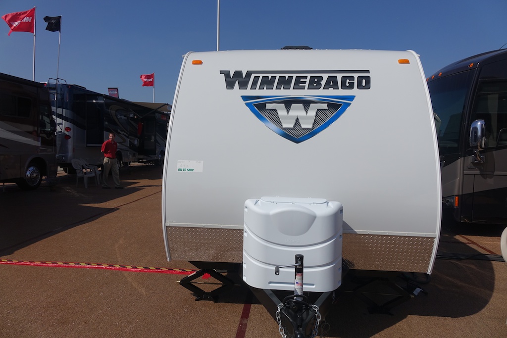 Hitch on Winnebago towable among product display.