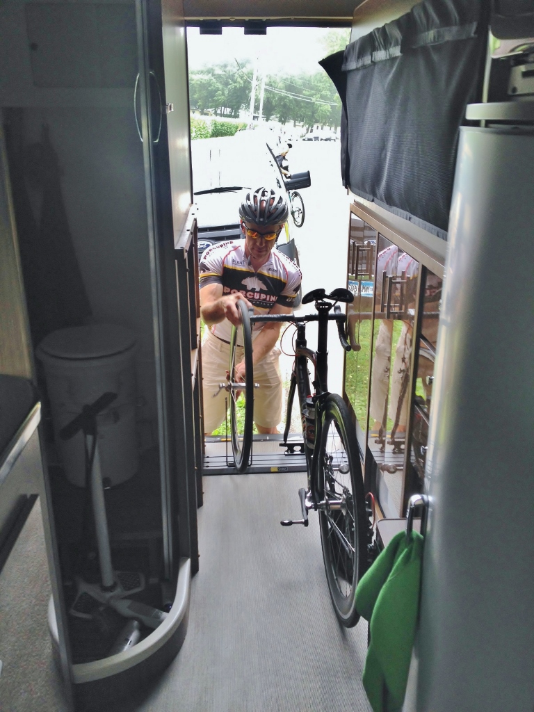 James loading biking gear into Winnebago Travato.