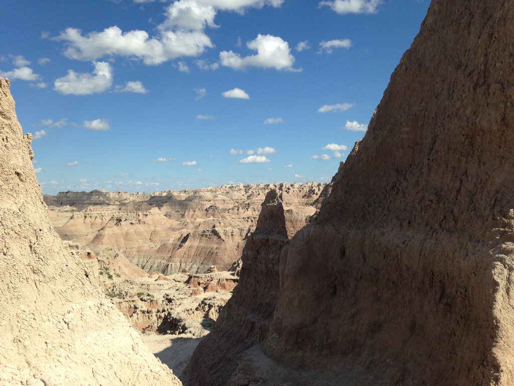 Multicolored canyons reaching as far as the eye can see.