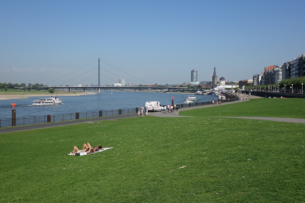 People walking along the Rhine in Dusseldorf.