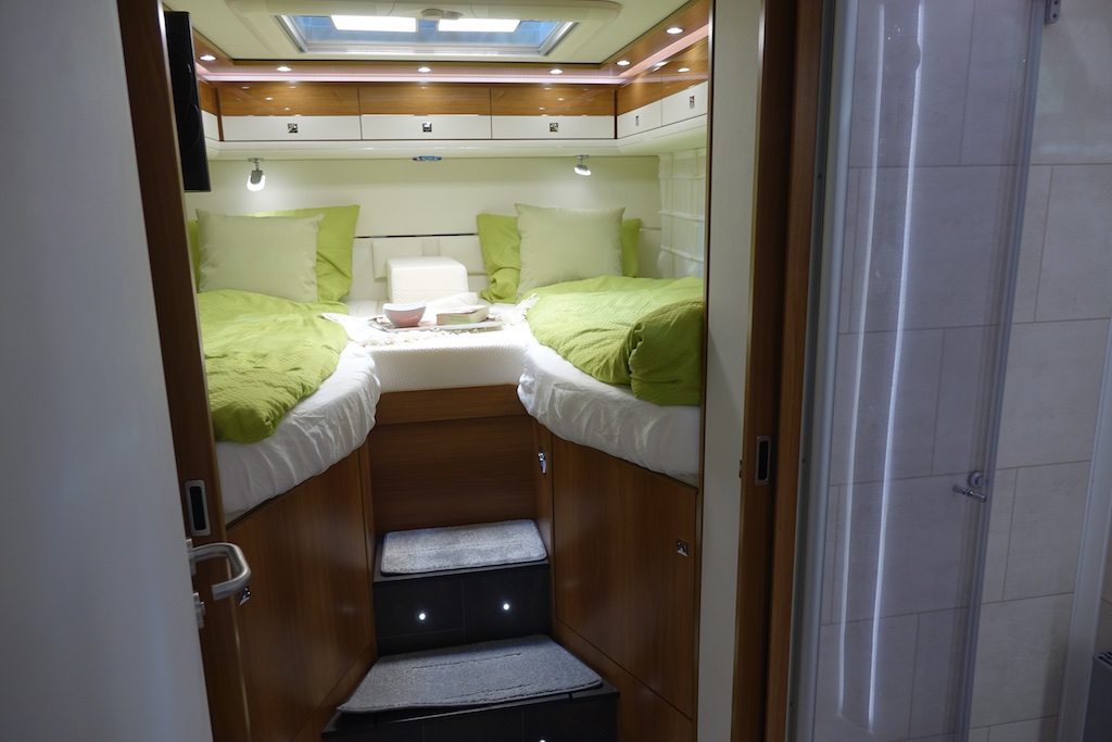 Raised rear beds in an RV.