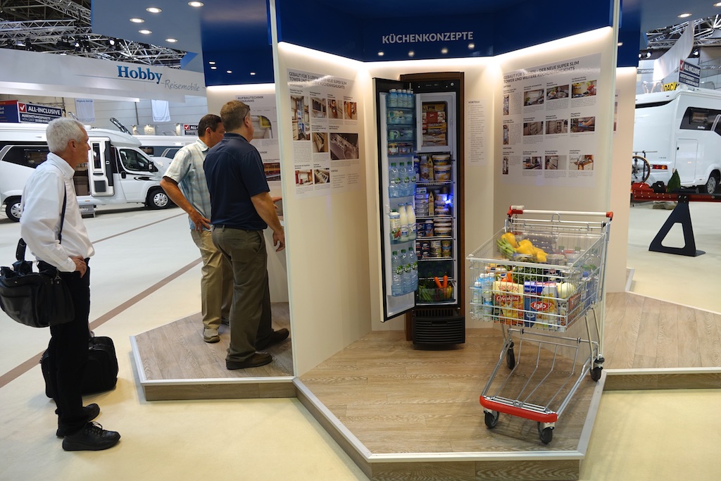 Display showing a thin fridge model.