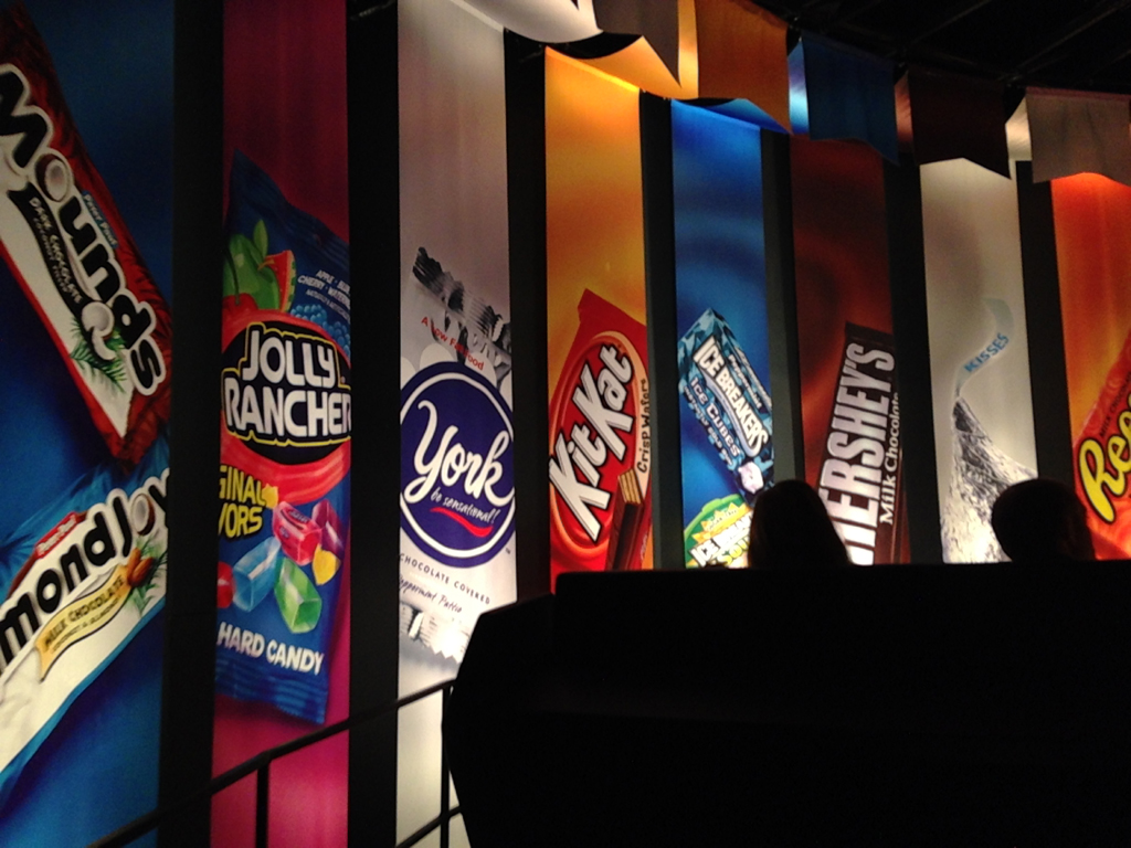 Panels with different types of candy at Hershey's Chocolate World.