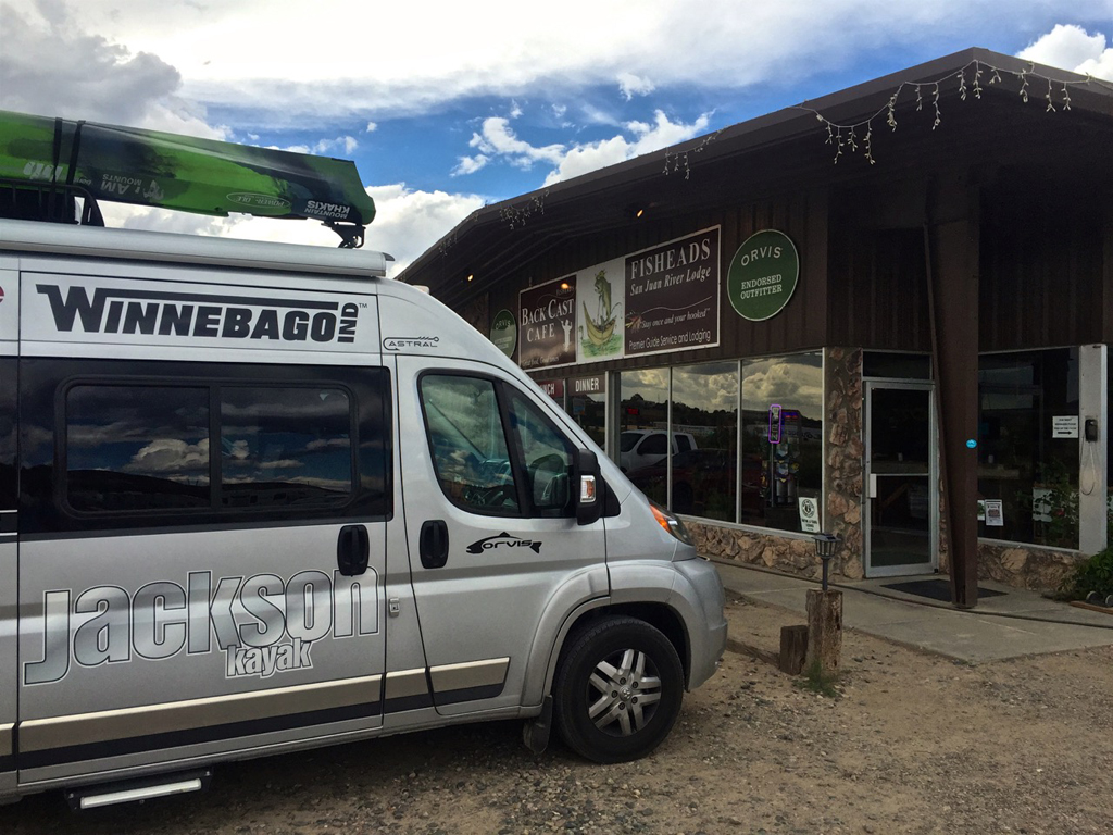 Winnebago Travato in front of Orvis shop.