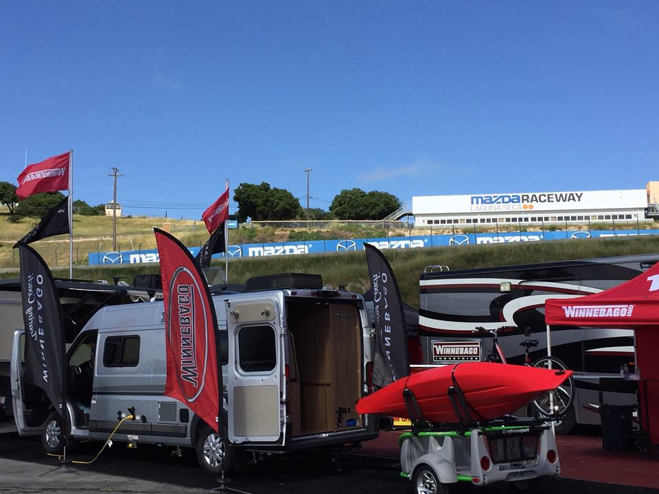 Winnebago product display at a raceway.