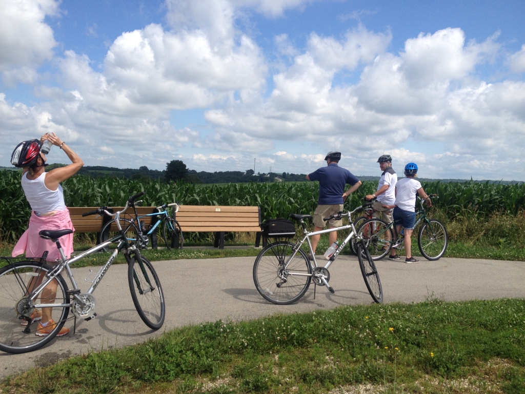 Bikers resting on a trail.