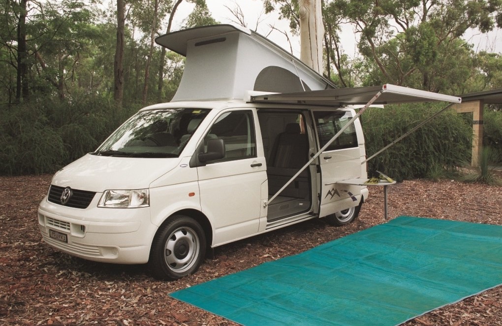 Sand free mat in use, placed in front of Volkswagon pop-top van